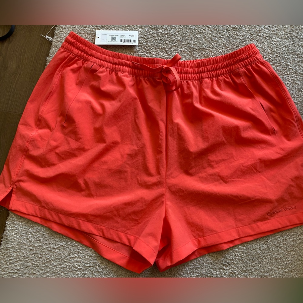 NWT Outdoor Voices Doing Things 2.5” shorts, in Hot Coral. 2 slit front pockets